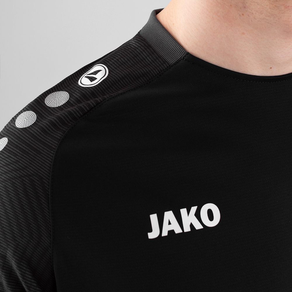 CAMISETA JAKO PERFORMANCE, NEGRA-ANTRACITA HOMBRE. 