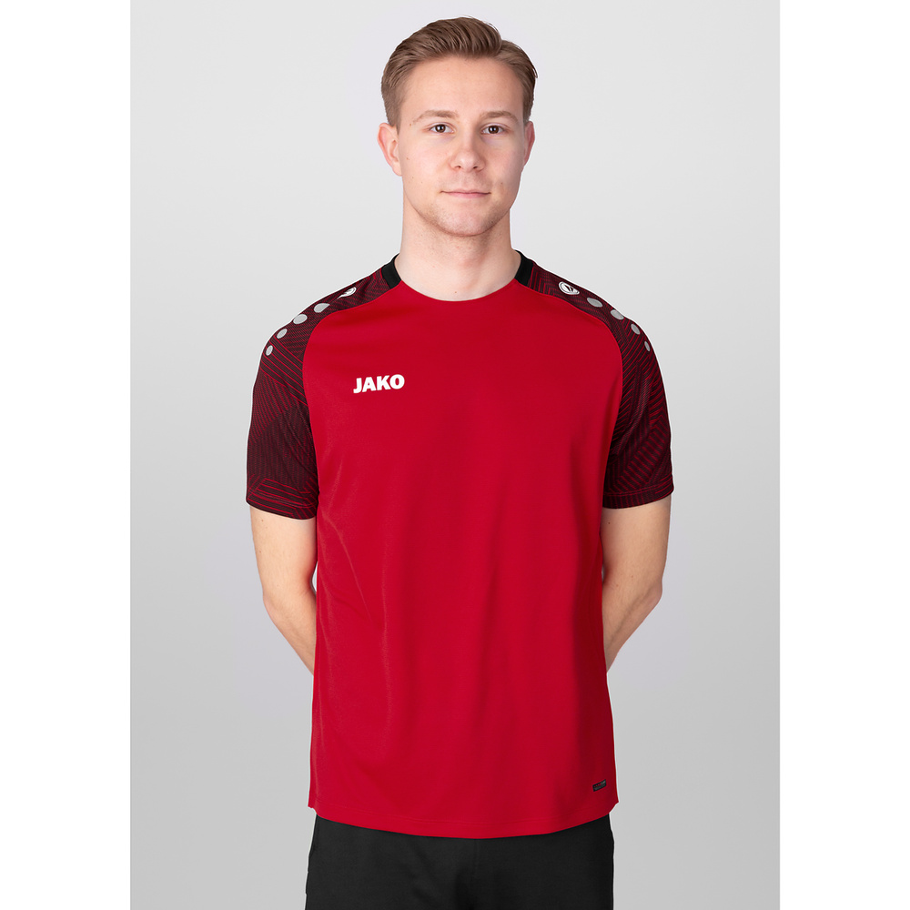 CAMISETA JAKO PERFORMANCE, ROJA-NEGRA HOMBRE. 