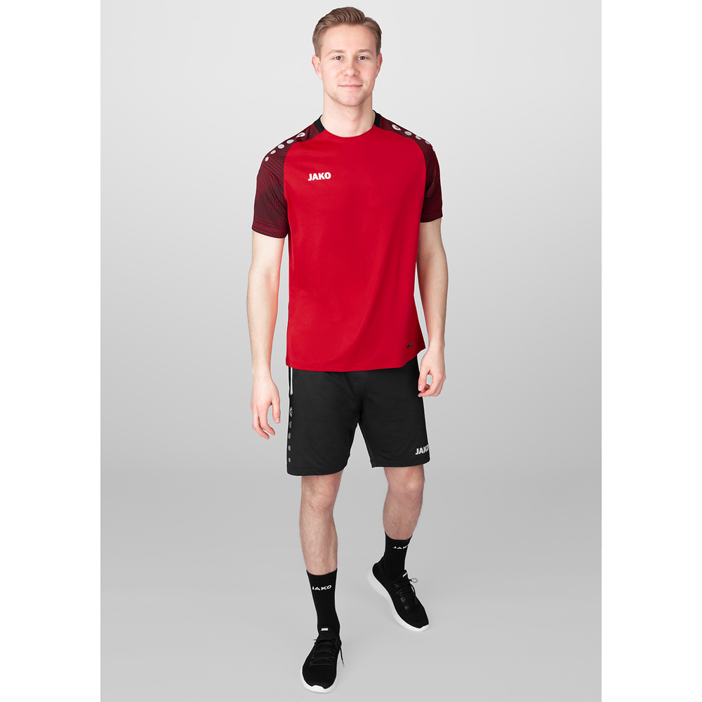 CAMISETA JAKO PERFORMANCE, ROJA-NEGRA HOMBRE. 