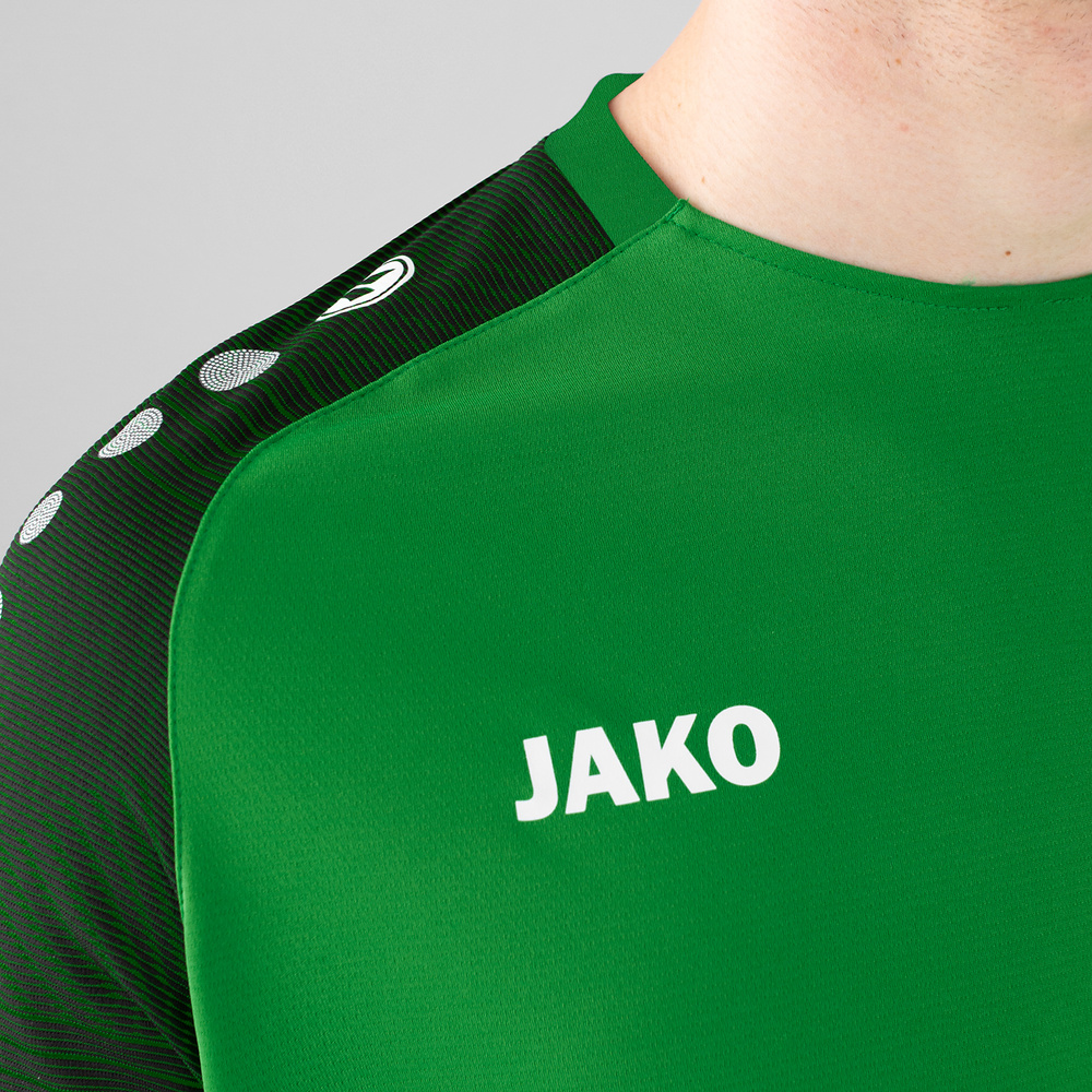 CAMISETA JAKO PERFORMANCE, VERDE-NEGRA NIÑO. 