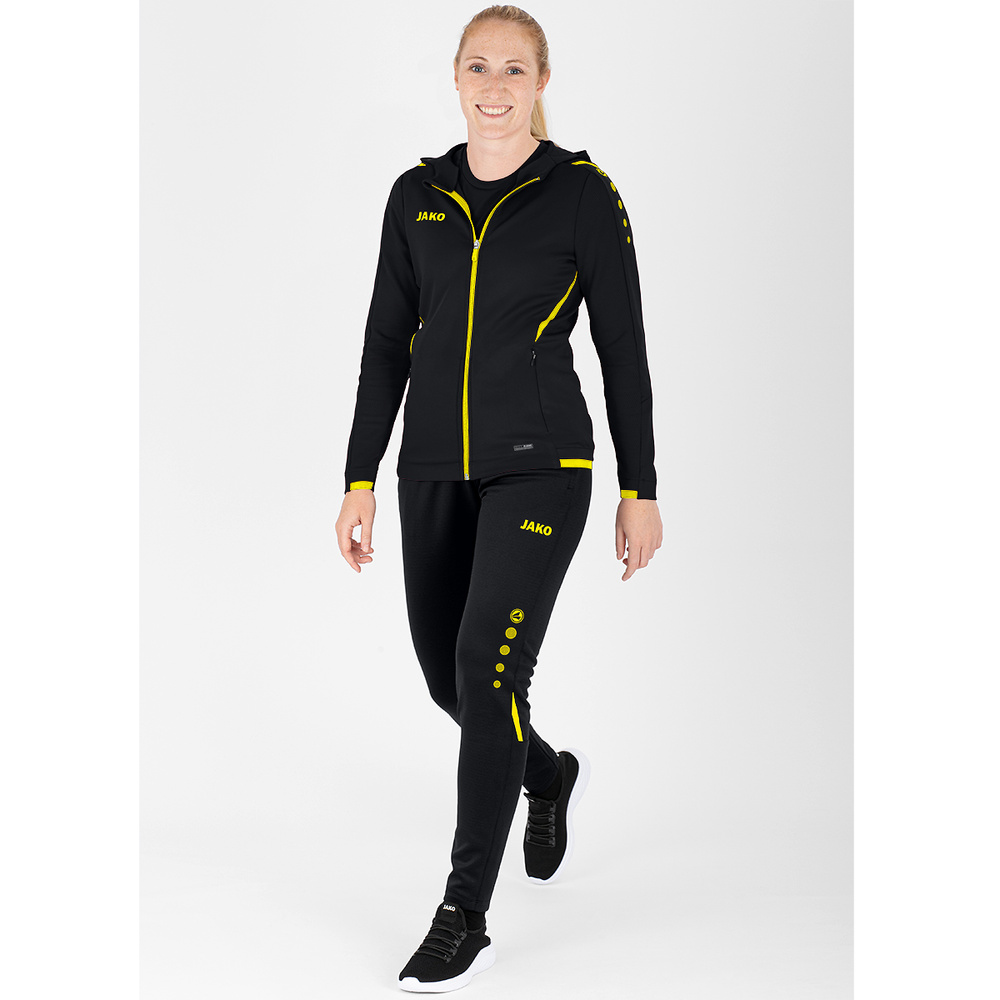 CHAQUETA DE ENTRENAMIENTO CON CAPUCHA JAKO CHALLENGE, NEGRA-AMARILLA MUJER. 