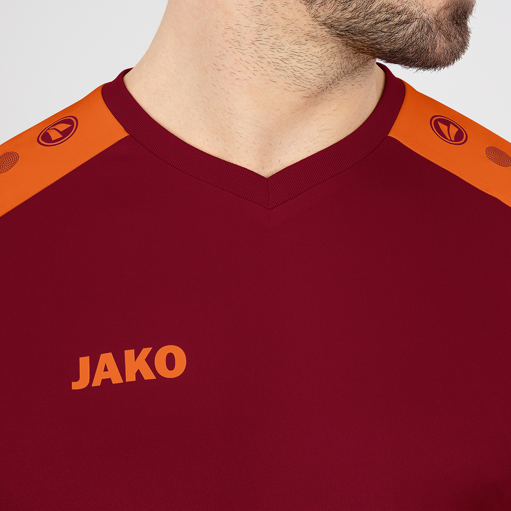 JERSEY JAKO CHAMP 2.0 SHORT SLEEVE, WINE RED-NEON ORANGE MEN. 
