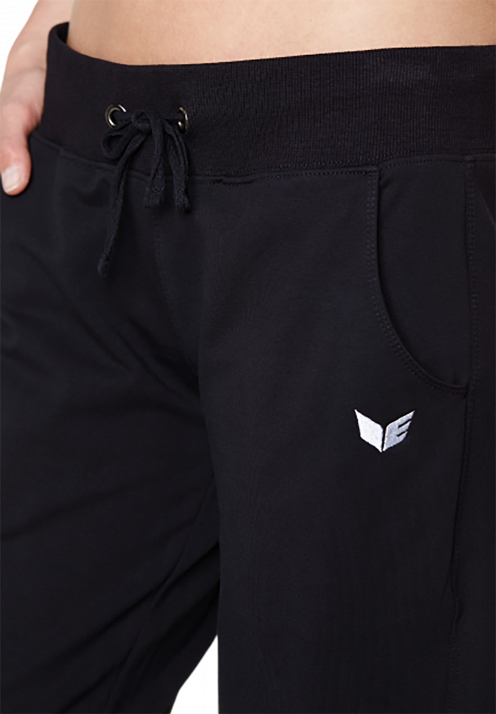 PANTALÓN DE CHÁNDAL ERIMA CON PUÑO, NEGRO MUJER. 