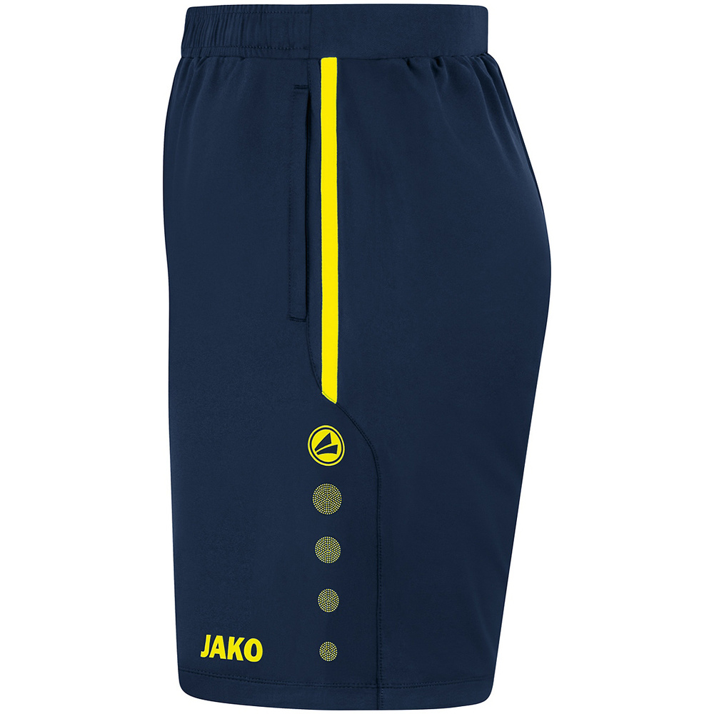 PANTALÓN DE ENTRENAMIENTO JAKO ALLROUND, MARINO-AMARILLO NEÓN HOMBRE. 