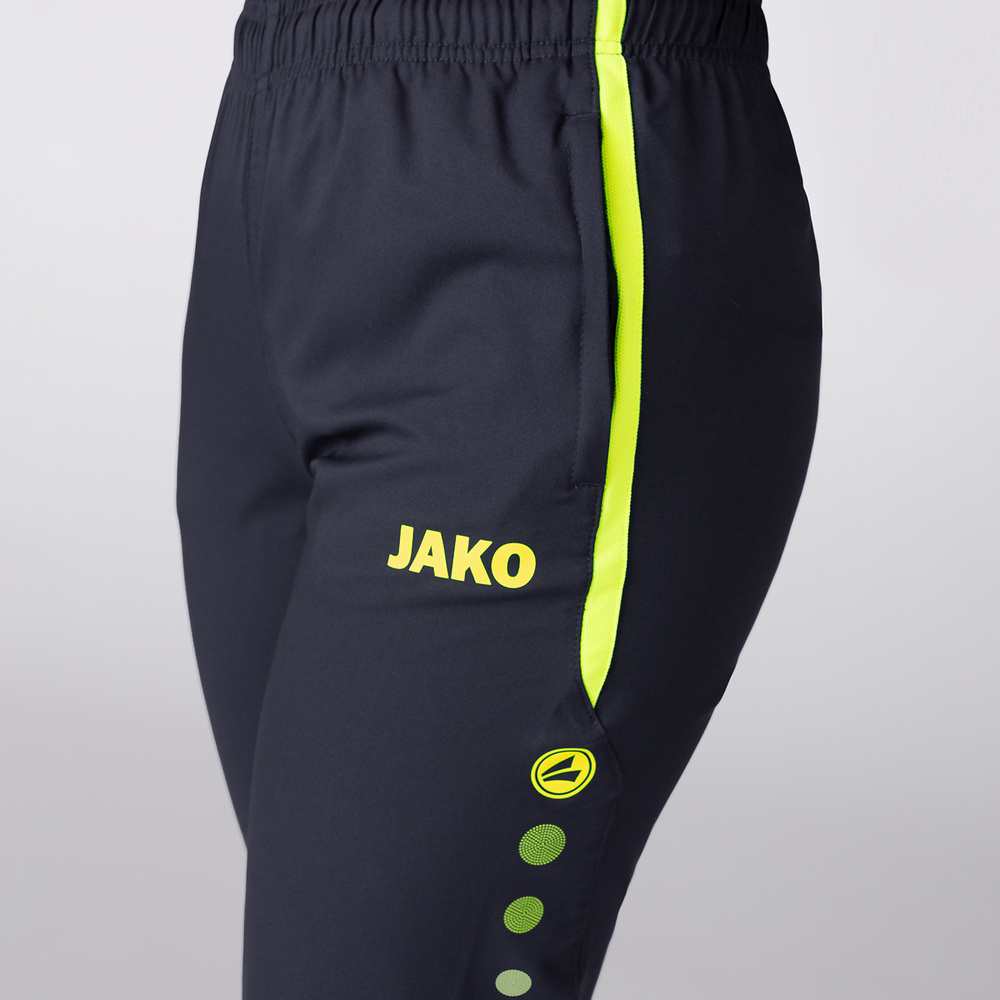 PANTALÓN DE PRESENTACIÓN JAKO ALLROUND, MARINO-AMARILLO MUJER. 