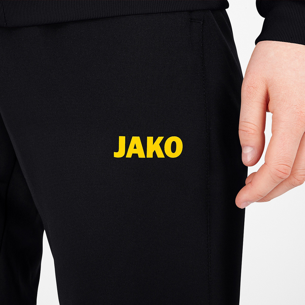 PANTALÓN POLIÉSTER JAKO CHALLENGE, NEGRO-AMARILLO MUJER. 