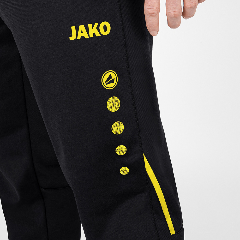 PANTALÓN POLIÉSTER JAKO CHALLENGE, NEGRO-AMARILLO NIÑO. 