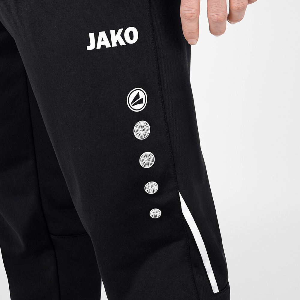 PANTALÓN POLIÉSTER JAKO CHALLENGE, NEGRO-BLANCO HOMBRE. 