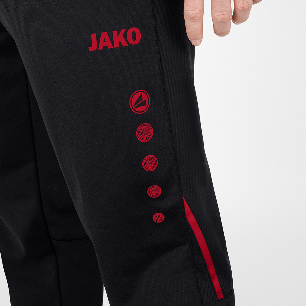 PANTALÓN POLIÉSTER JAKO CHALLENGE, NEGRO-ROJO HOMBRE. 