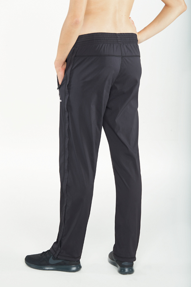 PANTALONES ERIMA ATHLETICS CON CREMALLERA LARGA, NEGRO MUJER. 