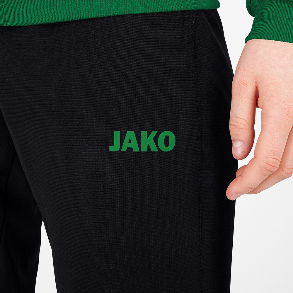 POLYESTER TROUSERS JAKO CHALLENGE, BLACK-SPORT. GREEN WOMEN. 