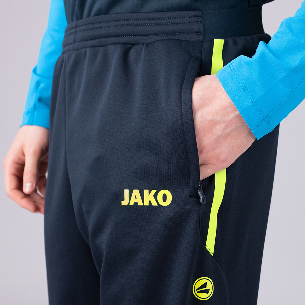 TRAINING TROUSERS JAKO ALLROUND, SEABLUE-NEON YELLOW MEN. 